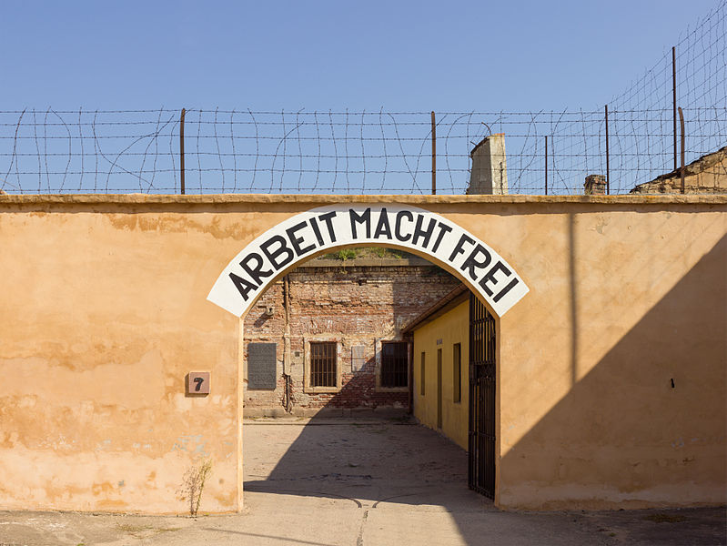 Theresienstadt concentration camp archway with the phrase "Arbeit macht frei" (work makes (you) free), placed over the entrance in a number of Nazi concentration camps. (Creative Commons/Godot13)