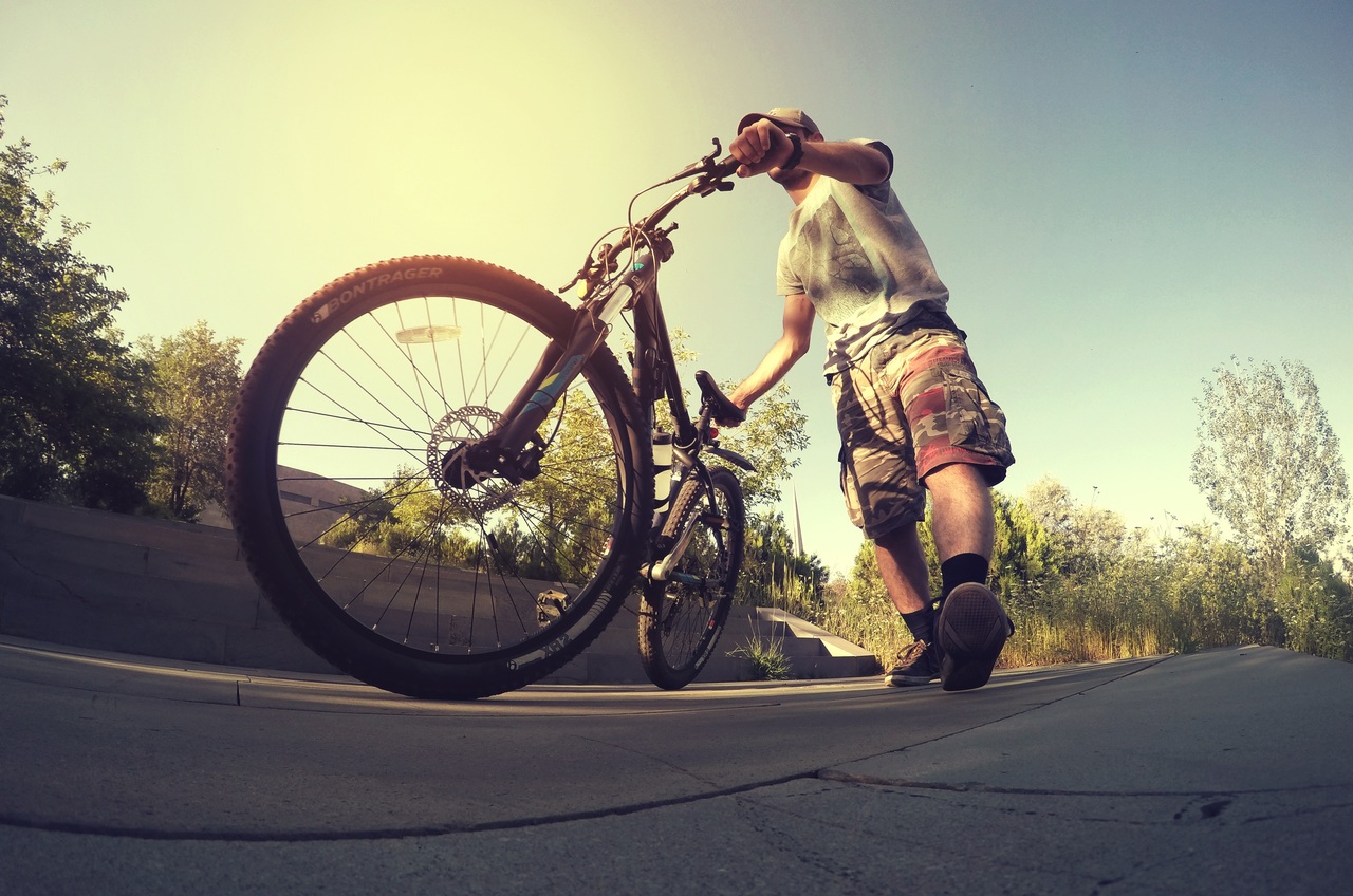 man cycling in sun