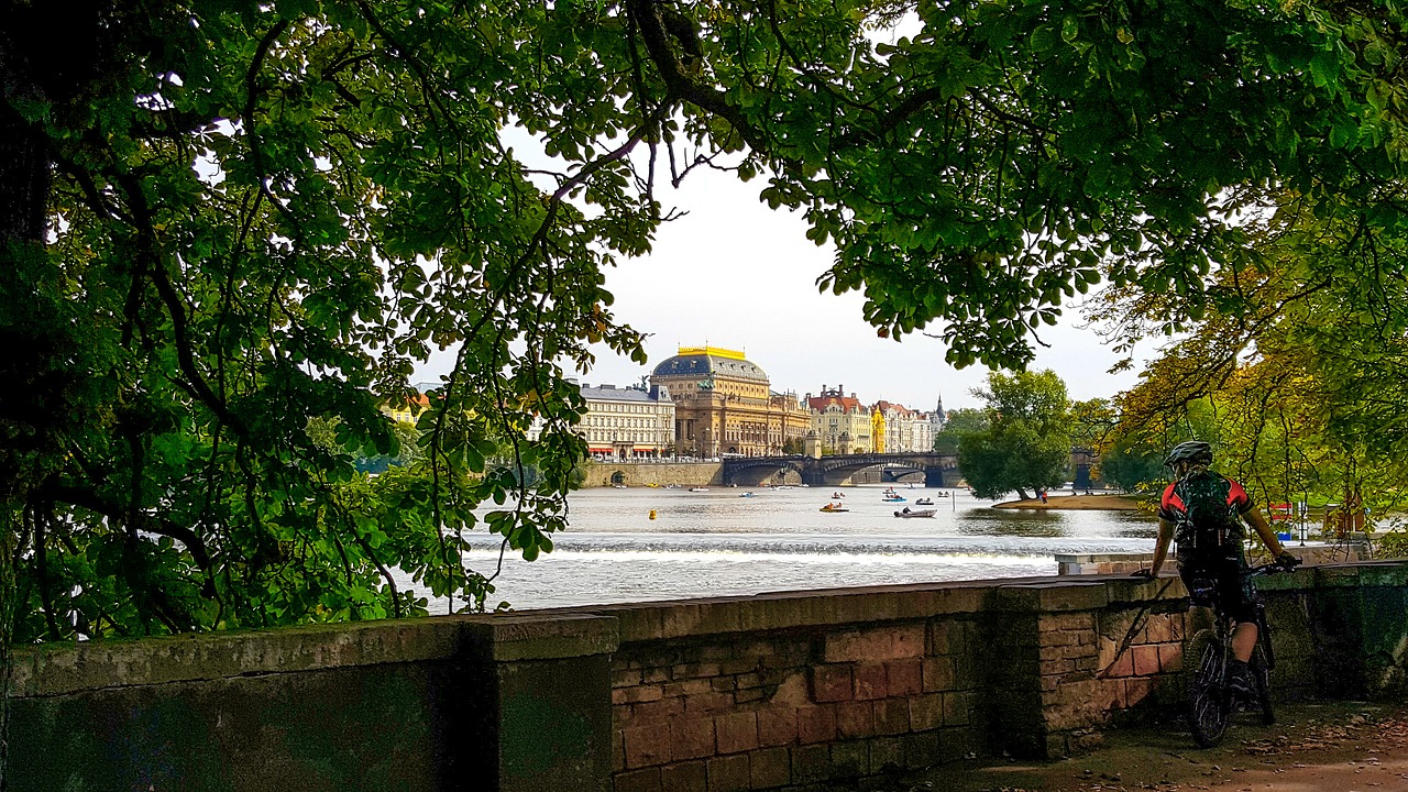 Biker watching Vltava river, Prague