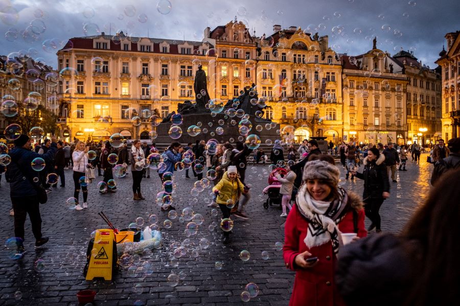 People enjoying in Prague at night