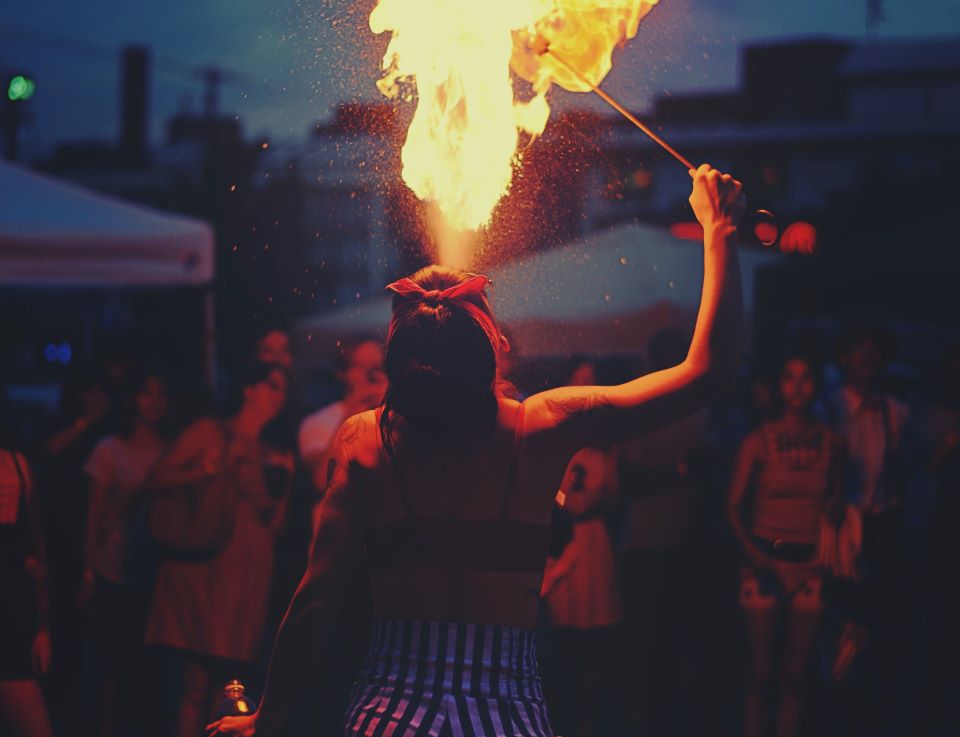Woman performing fire spitting