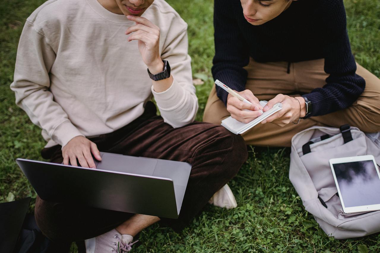 students with laptop